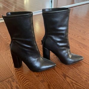 Black pointed toe booties